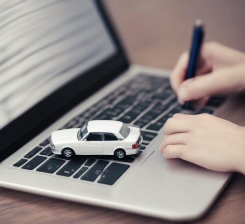 a white car place on laptop